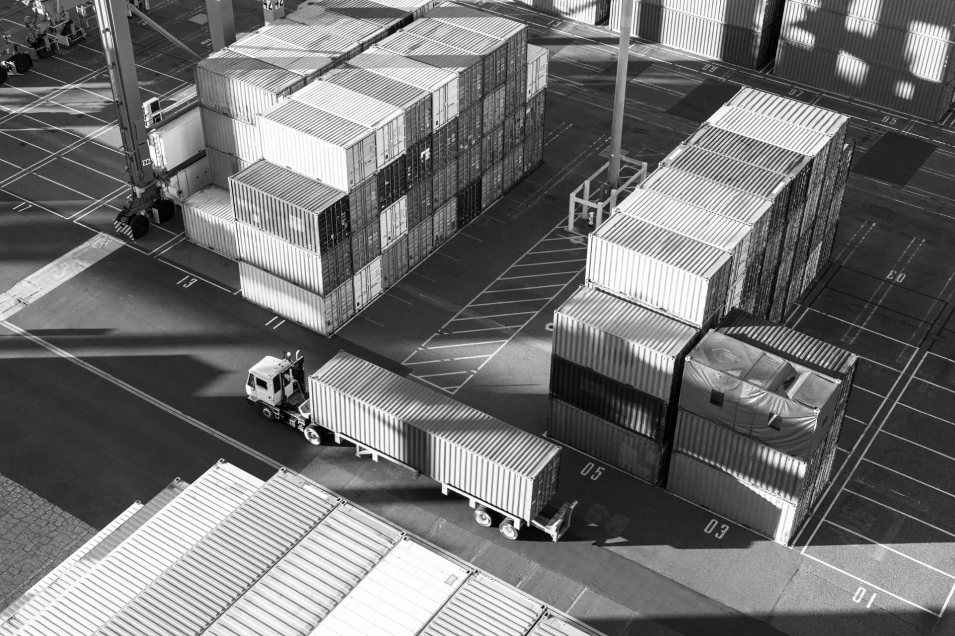Logistics yard with stacked shipping containers